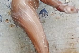 Village Tamil aunty had a lot of fun by massaging her penis after bath.